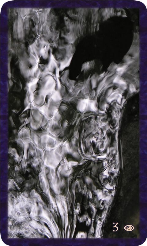 Macro photo of white and black swirling water. Gratitude Tarot card Three of Awareness: find the thread of happy coincidence that joins you to me.