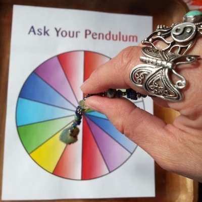Butterfly Shaman Teresa Deak demonstrating using her pendulum. What do you do when your pendulum won't give you a yes or no answer?