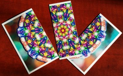 K's Namesake Essence Mandala is cut into strips to create the butterflies.