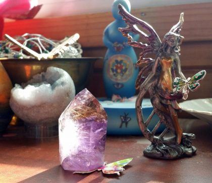 Butterfly and Ametrine point in the midst of a Rock The Butterfly Essence Session.